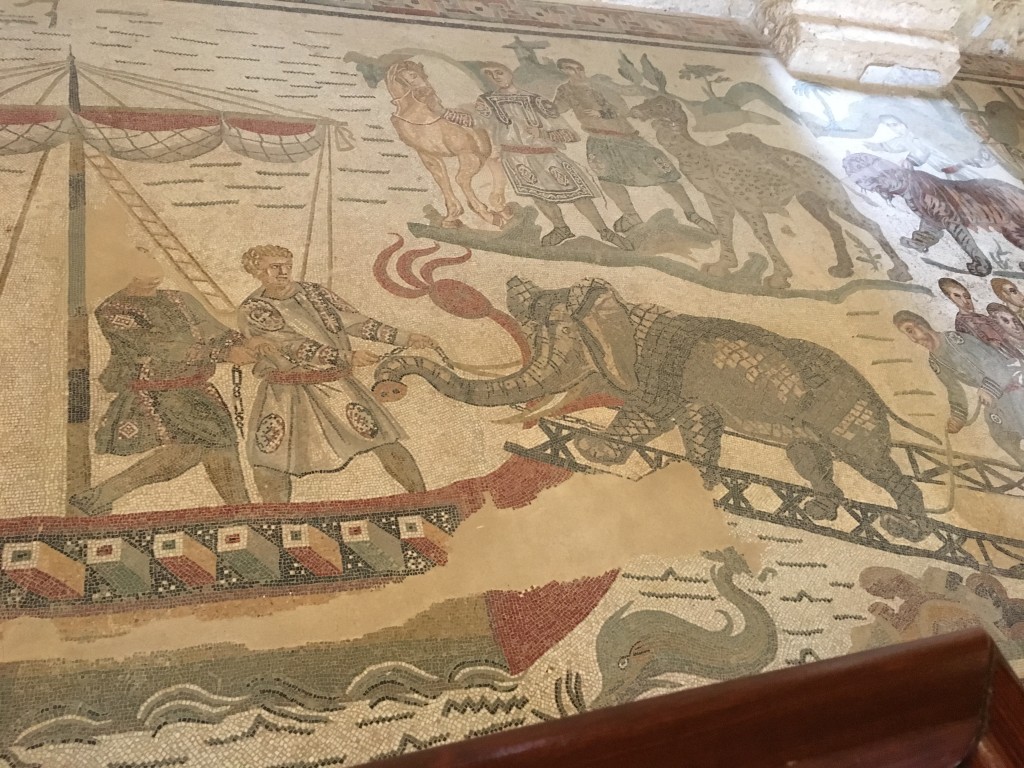 Portion of the hunting mosaic - Elephant being loaded on to a boat 